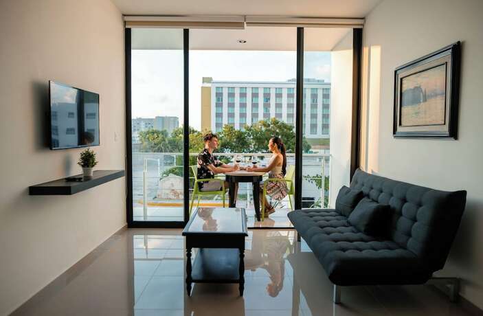 Imagen de la habitación del Hotel and Suites Yuca Ville. Foto 20