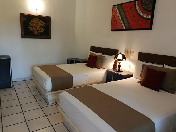 Imagen de la habitación del Hotel and Temazcal Hacienda De Melaque. Foto 10