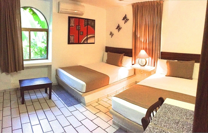 Imagen de la habitación del Hotel and Temazcal Hacienda De Melaque. Foto 12