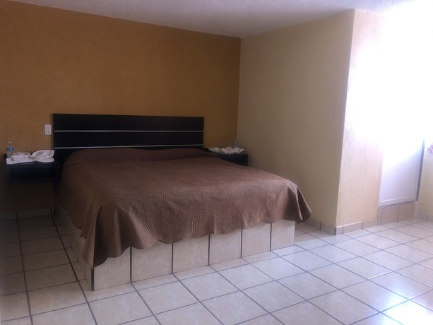 Imagen de la habitación del Hotel and Villas Monarca Circuito. Foto 4