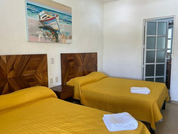 Imagen de la habitación del Hotel and Villas Palma Real. Foto 17