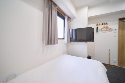 Imagen de la habitación del Hotel ano, Sumida-Ku. Foto 17