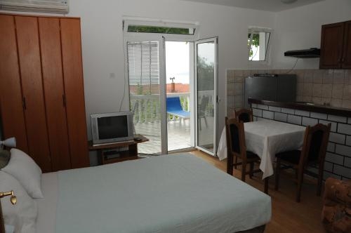 Imagen de la habitación del Hotel apartments dragi&scaron;ić. Foto 6