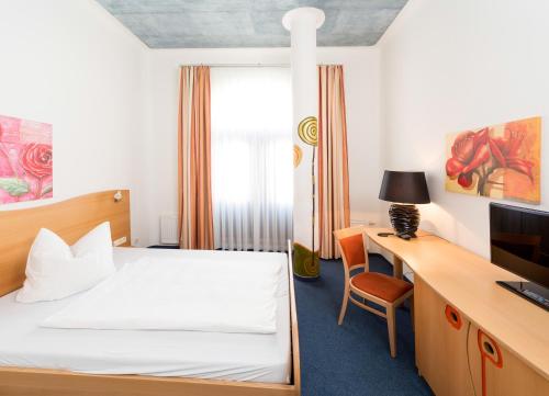Imagen de la habitación del Hotel artHOTEL Magdeburg. Foto 10
