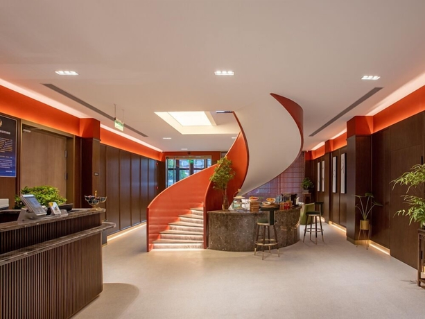 Imagen de los interiores del Hotel beijingyonghegongsiheyuanyunjujiudian. Foto 18