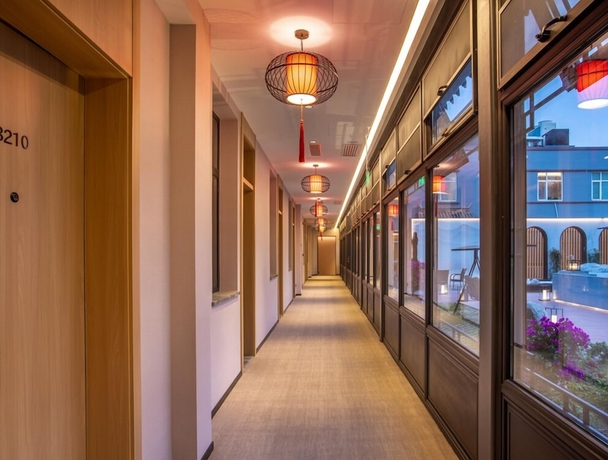 Imagen de la habitación del Hotel beijingyonghegongsiheyuanyunjujiudian. Foto 4