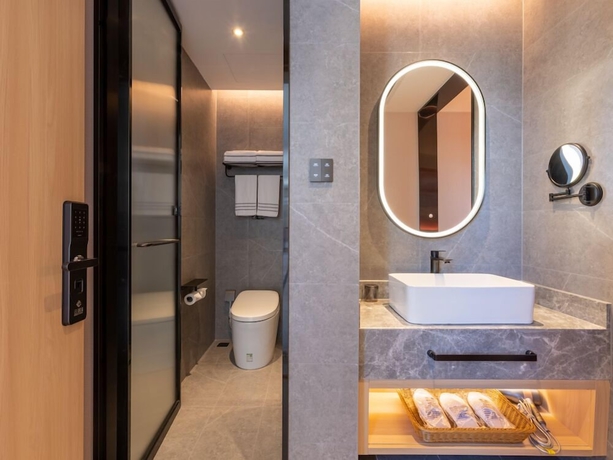 Imagen de la habitación del Hotel beijingyonghegongsiheyuanyunjujiudian. Foto 12