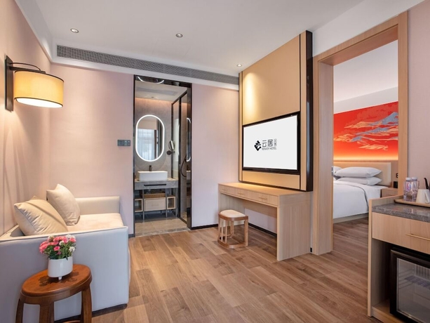 Imagen de la habitación del Hotel beijingyonghegongsiheyuanyunjujiudian. Foto 13