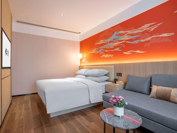 Imagen de la habitación del Hotel beijingyonghegongsiheyuanyunjujiudian. Foto 14
