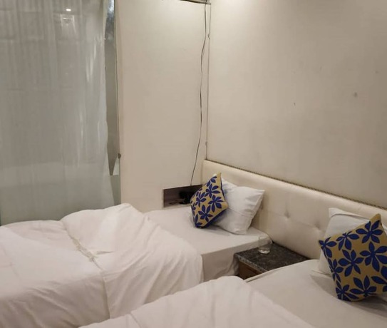 Imagen de la habitación del Hotel brijwasi palace. Foto 17