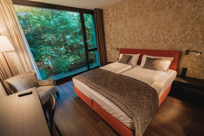 Imagen de la habitación del Hotel b_smart hotel Widnau. Foto 9