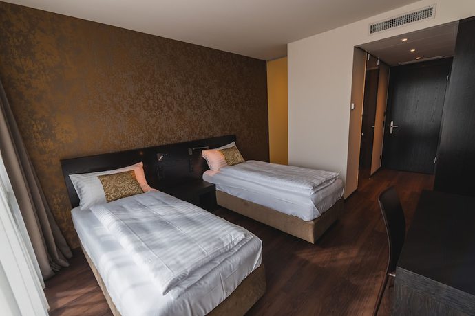 Imagen de la habitación del Hotel b_smart hotel Widnau. Foto 14