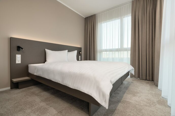 Imagen de la habitación del Hotel bsmart motel Schaan. Foto 11