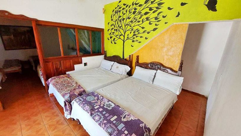 Imagen de la habitación del Hotel bungalows mirna manzanillo. Foto 5