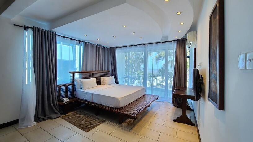 Imagen de la habitación del Hotel c3 Cowrie Shell Residences. Foto 13