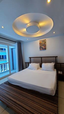 Imagen de la habitación del Hotel c3 Cowrie Shell Residences. Foto 14