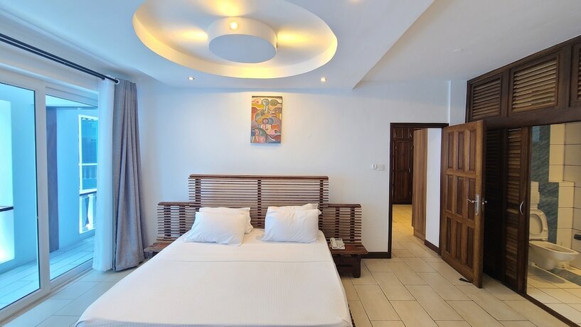 Imagen de la habitación del Hotel c3 Cowrie Shell Residences. Foto 18
