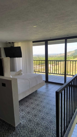 Imagen de la habitación del Hotel catleya royal club. Foto 14