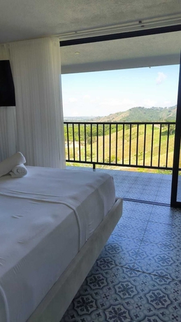 Imagen de la habitación del Hotel catleya royal club. Foto 15