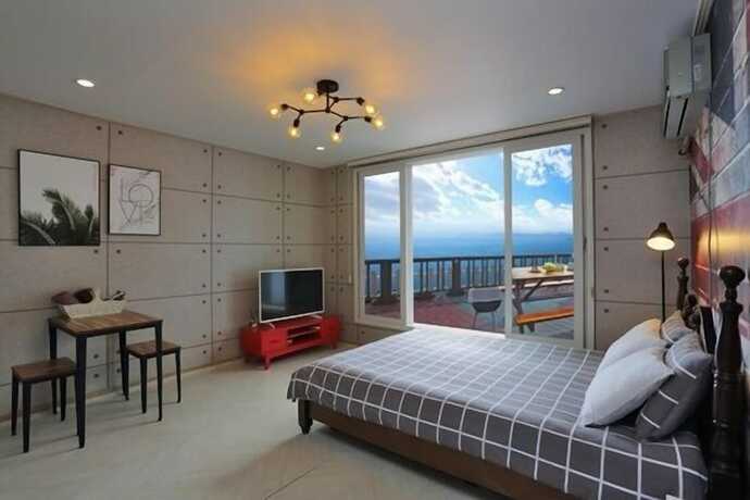 Imagen de la habitación del Hotel chocolate. Foto 12