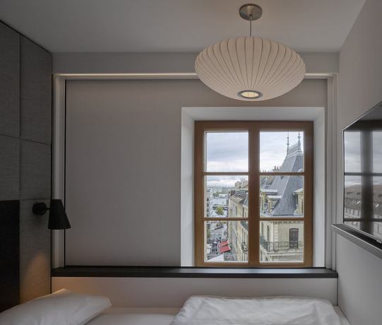 Imagen de la habitación del Hotel citizenM Geneva. Foto 4