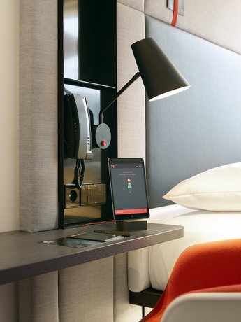Imagen de la habitación del Hotel citizenM Geneva. Foto 5
