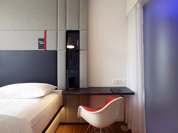 Imagen de la habitación del Hotel citizenM Geneva. Foto 6