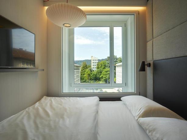 Imagen de la habitación del Hotel citizenM Zürich. Foto 2