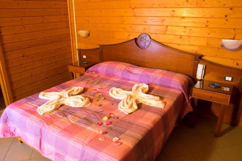 Imagen de la habitación del Hotel cupido park. Foto 16