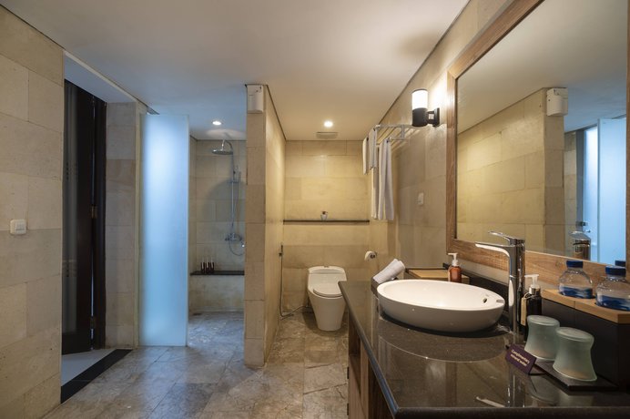 Imagen de la habitación del Hotel d'Nusa Beach Club and Resort. Foto 18