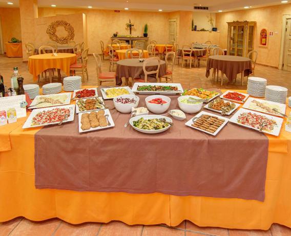 Imagen del bar/restaurante del Hotel dP Olbia - Sardinia. Foto 8