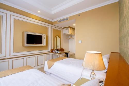 Imagen de la habitación del Hotel d'Primahotel Bandung. Foto 6