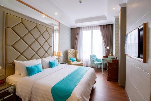 Imagen de la habitación del Hotel d'Primahotel Bandung. Foto 9