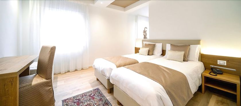 Imagen de la habitación del Hotel da Tullio. Foto 5