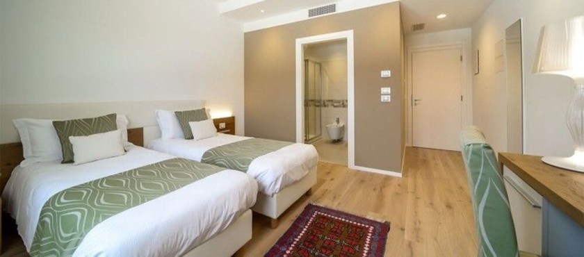 Imagen de la habitación del Hotel da Tullio. Foto 9