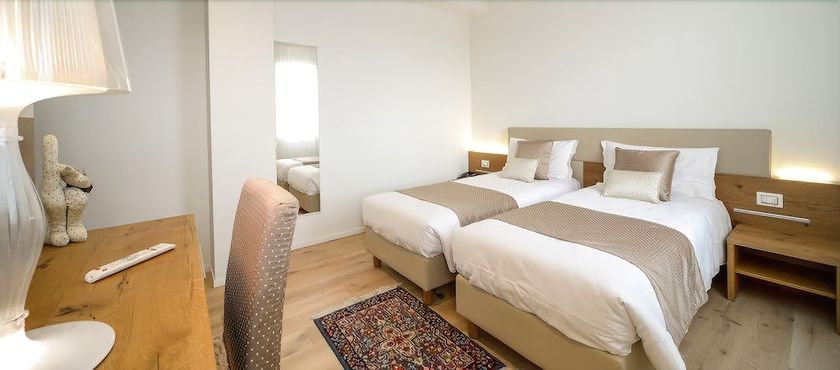 Imagen de la habitación del Hotel da Tullio. Foto 13