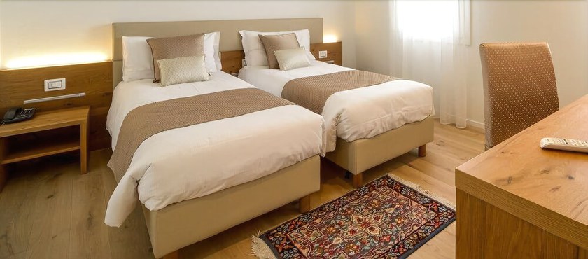 Imagen de la habitación del Hotel da Tullio. Foto 14