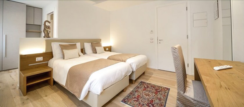 Imagen de la habitación del Hotel da Tullio. Foto 15