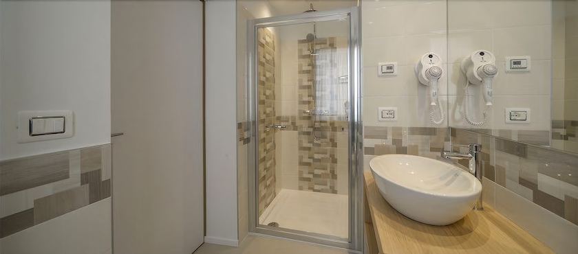 Imagen de la habitación del Hotel da Tullio. Foto 16