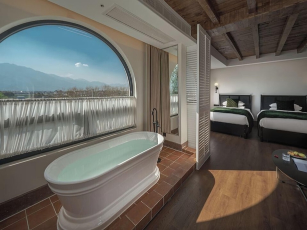 Imagen de la habitación del Hotel dalishanhaixijingminsu. Foto 2