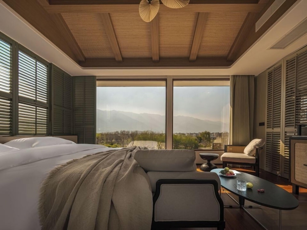 Imagen de la habitación del Hotel dalishanhaixijingminsu. Foto 6
