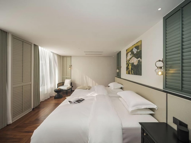 Imagen de la habitación del Hotel dalishanhaixijingminsu. Foto 9