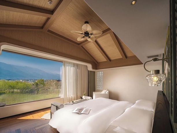 Imagen de la habitación del Hotel dalishanhaixijingminsu. Foto 10