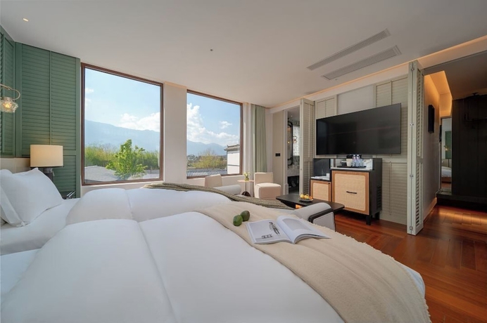 Imagen de la habitación del Hotel dalishanhaixijingminsu. Foto 15