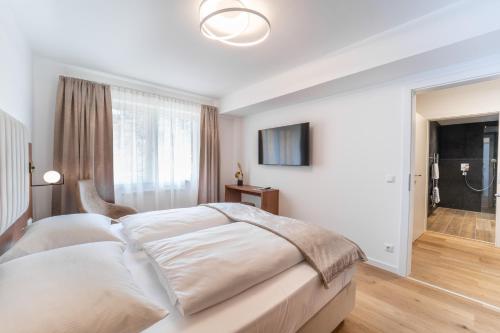 Imagen de la habitación del Hotel das mondsee. Foto 13