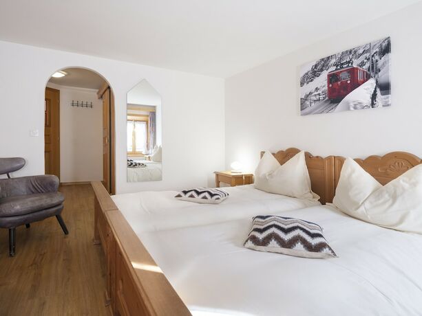 Imagen de la habitación del Hotel de Commune Rougemont. Foto 16