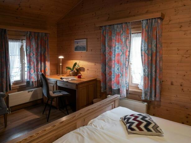 Imagen de la habitación del Hotel de Commune Rougemont. Foto 17