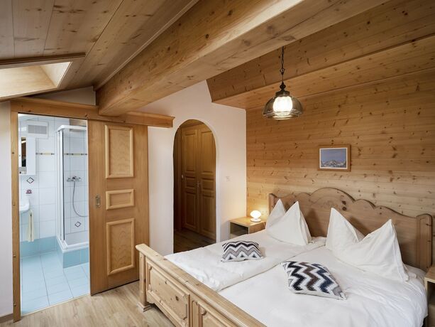 Imagen de la habitación del Hotel de Commune Rougemont. Foto 18