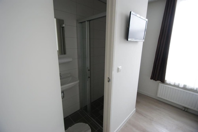 Imagen de la habitación del Hotel de Keizerskroon, Halfweg. Foto 2