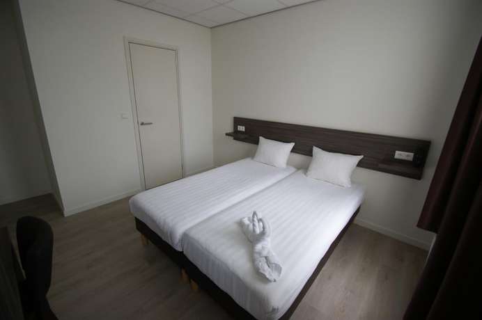 Imagen de la habitación del Hotel de Keizerskroon, Halfweg. Foto 6